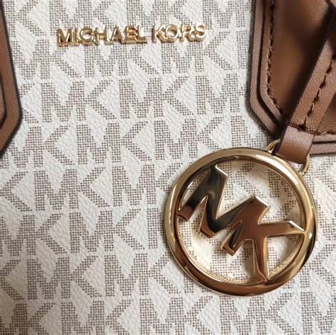 michael kors metal logo.